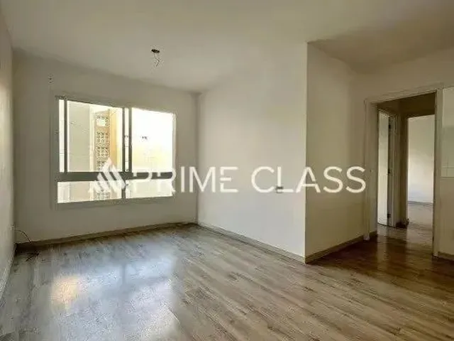 Imagem: O apartamento possui 2 Dormitórios, 1 Suíte, 2 Banheiros,