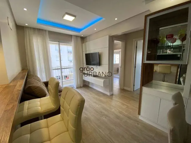 Imagem: O apartamento possui 2 Dormitórios, 1 Suíte, 2 Banheiros,