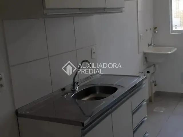 Imagem: O apartamento possui 2 Dormitórios, 1 Banheiro, 1 Vaga na