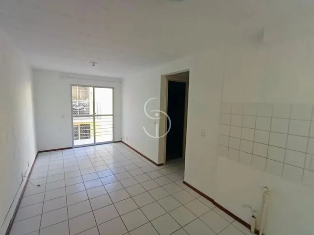 Imagem: O apartamento possui 2 Dormitórios, 1 Banheiro, 1 Vaga na