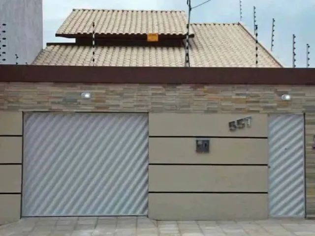 Imagem: A casa possui 3 Dormitórios, 3 Banheiros, 2 Vagas na