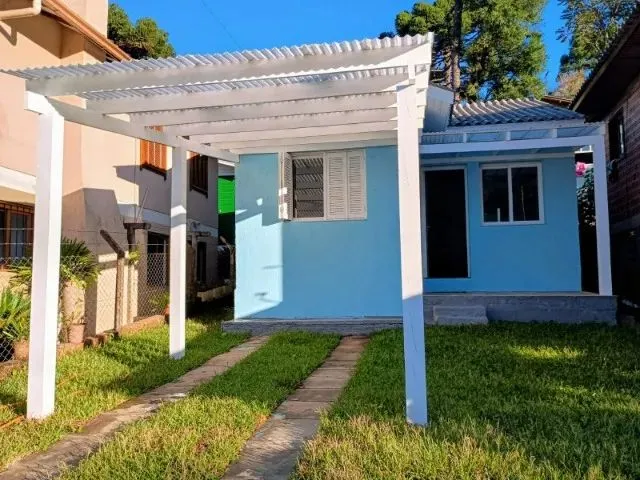 Imagem: A casa possui 2 Dormitórios, 1 Banheiro, 1 Vaga na