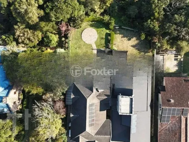 Imagem: A casa em condomínio possui 3 Dormitórios, 1 Banheiro, 2