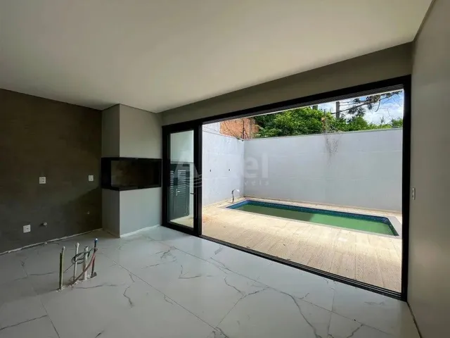 Imagem 11: Casa de 3 Dormitórios Sendo 1 Suíte no Centro de Passo Fundo, para Venda