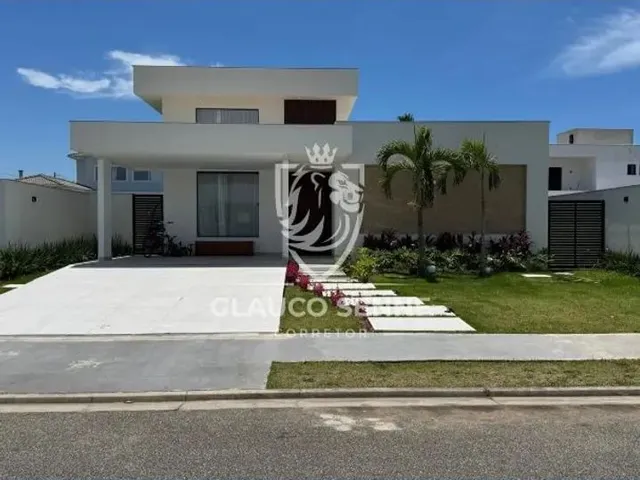 Imagem: A casa em condomínio possui 3 Dormitórios, 3 Suítes, 4
