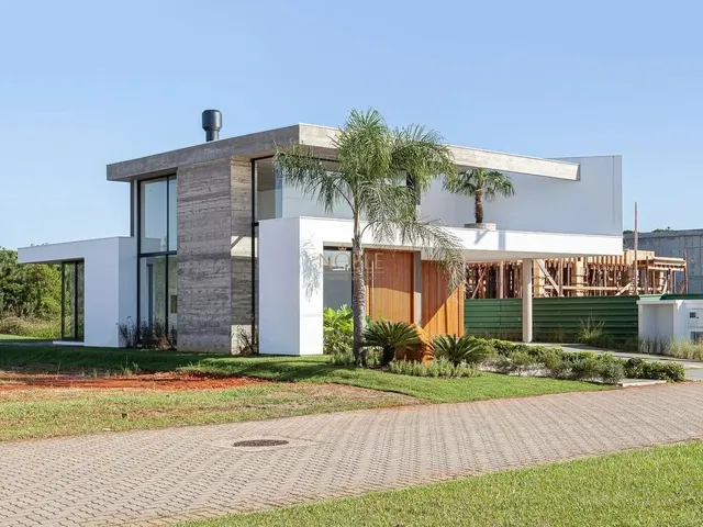 Imagem 15: Casa de Condominio com Concreto Aparente