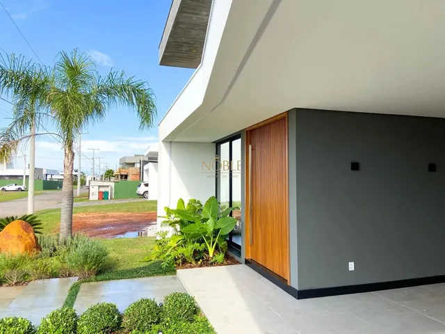 Imagem 11: Casa de Condominio com Concreto Aparente