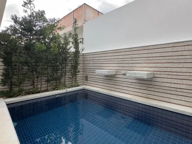 Imagem: A casa em condomínio possui 4 Dormitórios, 5 Banheiros, 4