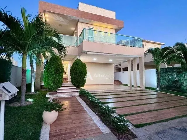 Imagem: A casa possui 4 Dormitórios, 4 Banheiros, 4 Vagas na