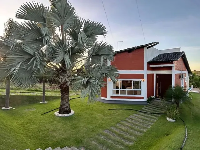 Imagem: A casa em condomínio possui 4 Dormitórios, 4 Suítes, 5