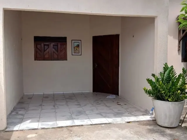 Imagem: A casa possui 3 Dormitórios, 3 Banheiros, 2 Vagas na
