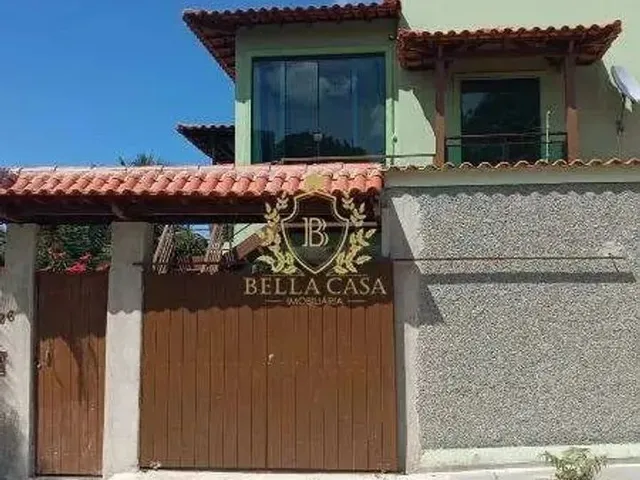 Imagem: A casa possui 3 Dormitórios, 3 Banheiros, 1 Vaga na