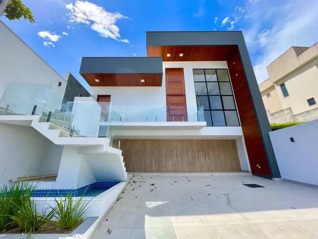 Imagem: A casa possui 3 Dormitórios, 1 Suíte, 2 Banheiros, 2