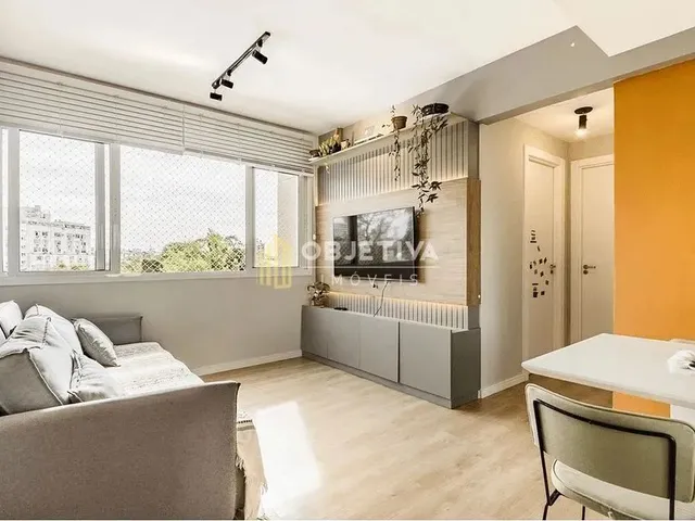 Imagem: O apartamento possui 2 Dormitórios, 1 Suíte, 2 Banheiros,