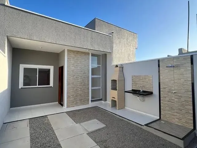 Imagem: A casa possui 2 Dormitórios, 1 Suíte, 2 Banheiros, 3
