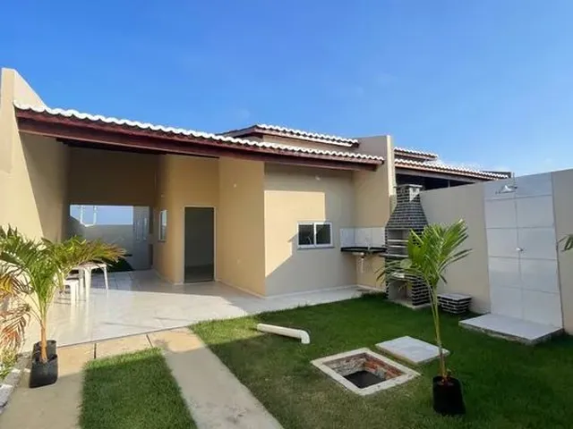Imagem: A casa possui 2 Dormitórios, 2 Banheiros, 3 Vagas na