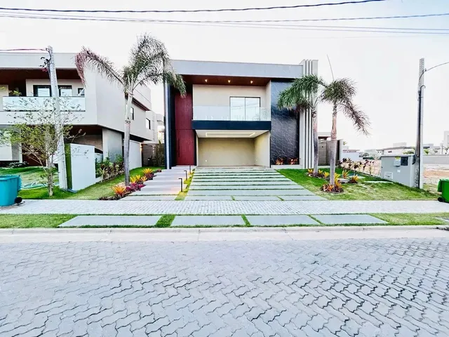 Imagem: A casa em condomínio possui 5 Dormitórios, 5 Suítes, 5