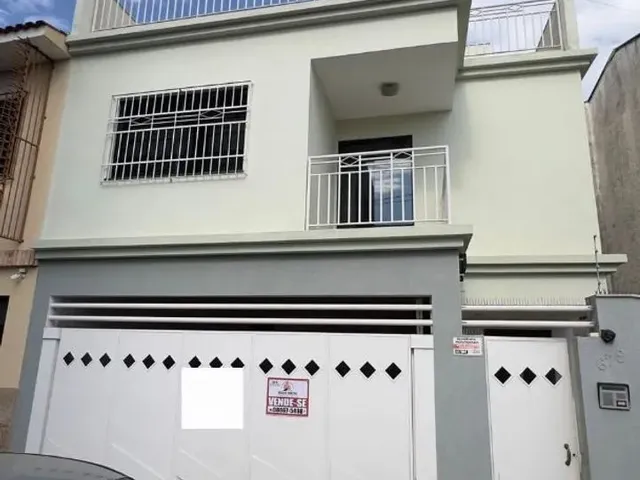 Imagem: A casa possui 3 Dormitórios, 4 Banheiros, 2 Vagas na