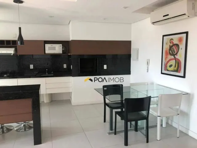 Imagem: O apartamento possui 1 Dormitório, 2 Banheiros, 1 Vaga na