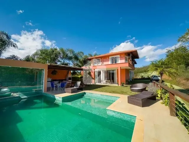 Imagem: A casa possui 5 Dormitórios, 5 Suítes, 5 Banheiros, 4