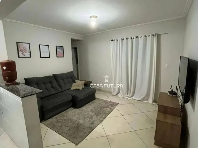 Imagem: O apartamento possui 2 Dormitórios, 1 Suíte, 2 Banheiros,