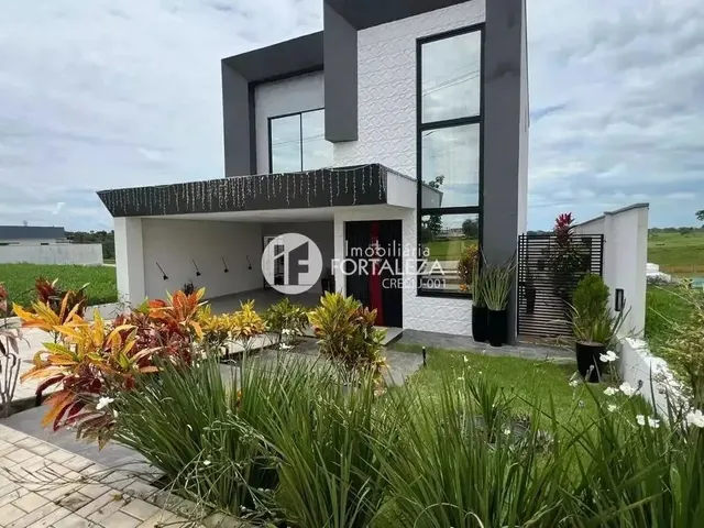 Imagem: A casa em condomínio possui 3 Dormitórios, 3 Suítes, 4