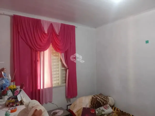 Imagem 8: Casa com 2 Quartos Toda Gradeada com Vaga de Garagem no Bairro Diácono Luiz Pozzobon Em