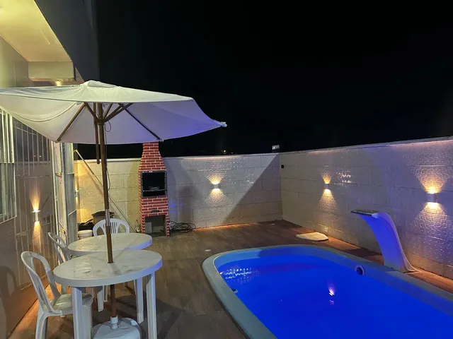 Imagem: A casa possui 3 Dormitórios, Acomodam 15 pessoas, 1 Vaga