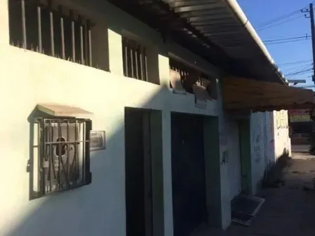 Imagem: A casa possui 3 Dormitórios, 1 Suíte, 5 Banheiros, 2