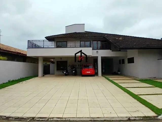 Imagem: A casa em condomínio possui 4 Dormitórios, 4 Suítes, 5
