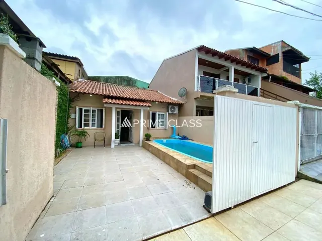 Imagem: A casa possui 2 Dormitórios, 1 Banheiro, 1 Vaga na