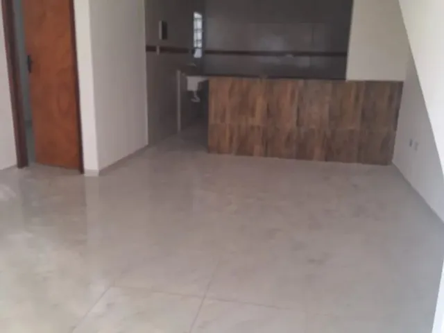 Imagem: A casa possui 2 Dormitórios, Acomodam 6 pessoas, 1 Vaga na