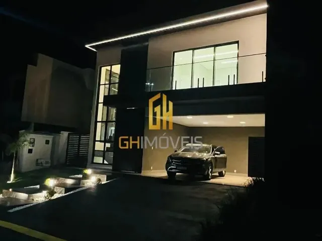 Imagem: A casa possui 3 Dormitórios, 3 Suítes, 5 Banheiros, 4