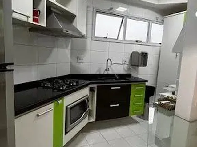 Imagem: O apartamento possui 2 Dormitórios, 1 Suíte, 2 Banheiros,