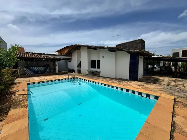 Imagem: A casa em condomínio possui 3 Dormitórios, 3 Suítes, 5