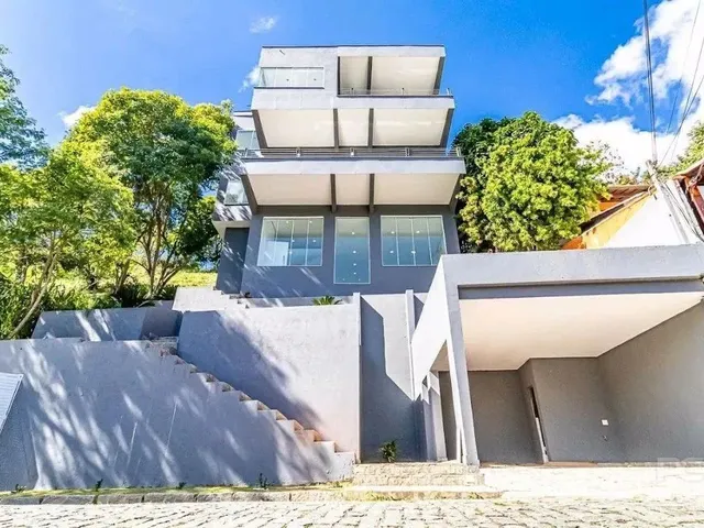 Imagem: A casa em condomínio possui 4 Dormitórios, 5 Banheiros, 2