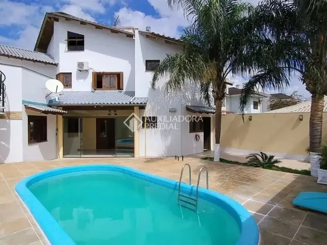 Imagem 1: Alugue Sobrado com 5 Quartos, Piscina, Hidromassagem e Academia em Canoas