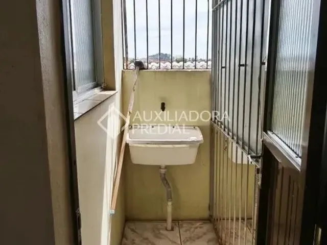 Imagem 3: Amplo Apartamento com 2 Quartos e Sacada em L