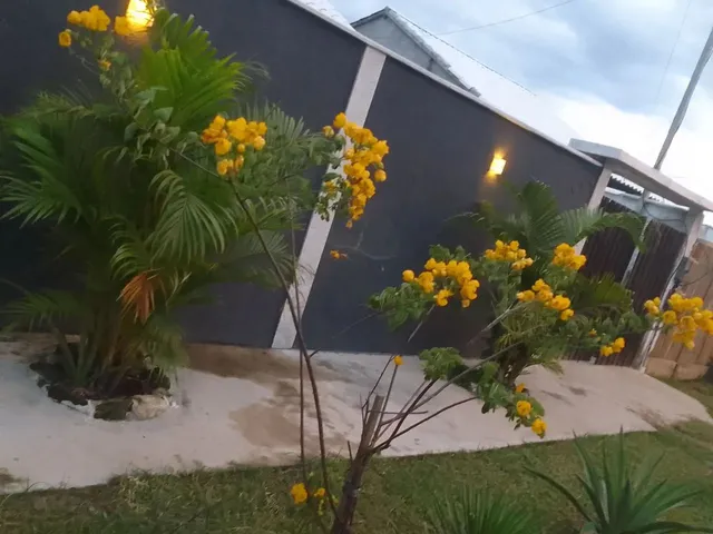 Imagem 2: Casa com Piscina e Garagem Coberta