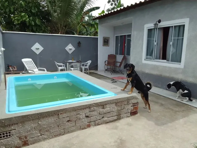Imagem 7: Casa com Piscina e Garagem Coberta