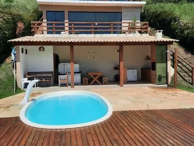 Imagem: A casa possui 2 Dormitórios, 2 Suítes, 3 Banheiros,