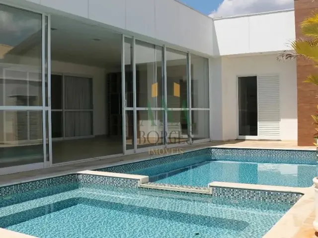Imagem: A casa possui 3 Dormitórios, 3 Suítes, 4 Banheiros,