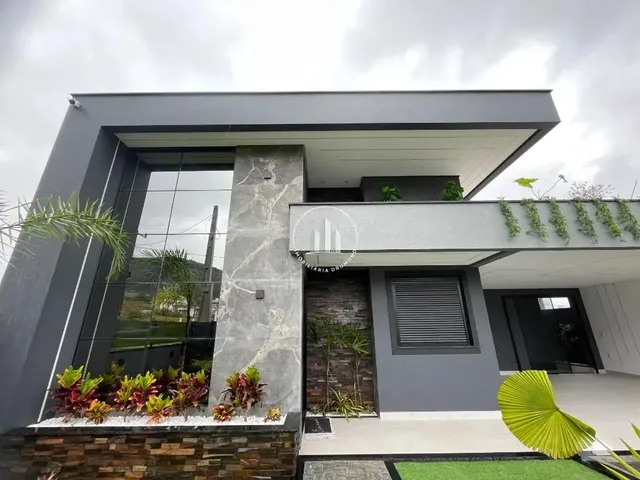 Imagem: A casa possui 3 Dormitórios, 2 Suítes, 3 Banheiros, 2