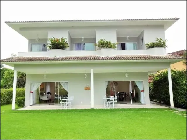 Imagem: A casa em condomínio possui 5 Dormitórios, 7 Suítes, 5