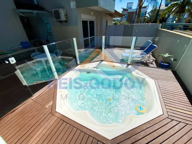 Imagem 3: Amplo Apartamento com Spa Privativo Próximo a Praia