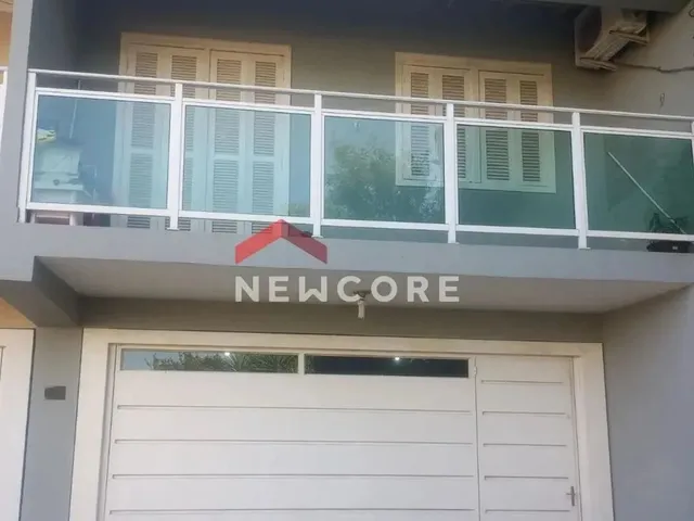 Imagem: A casa possui 2 Dormitórios, 1 Banheiro, 2 Vagas na