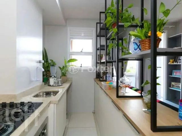Imagem: O apartamento possui 2 Dormitórios, 1 Banheiro, 1 Vaga na