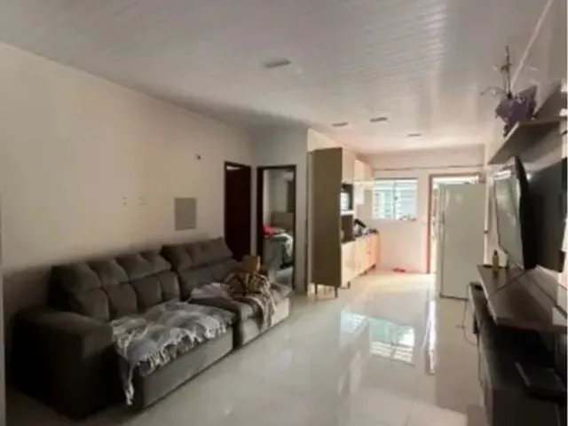 Imagem: A casa possui 3 Dormitórios, 1 Suíte, 2 Banheiros, 1 Vaga