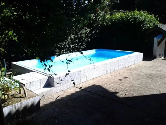Imagem: A casa possui 4 Dormitórios, 4 Suítes, 5 Banheiros, 4
