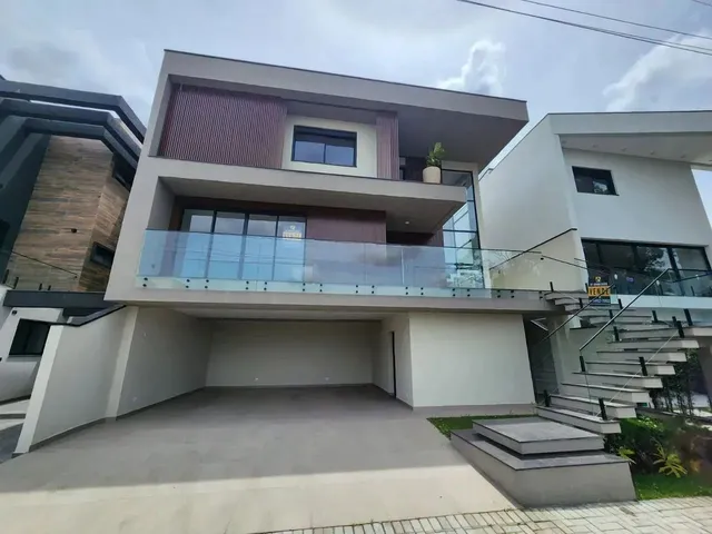Imagem 1: Casa Nova em Cond 265 M2 Priv. 3 Suítes com Closets, 4 Vagas, Amplo Quintal com Spa No